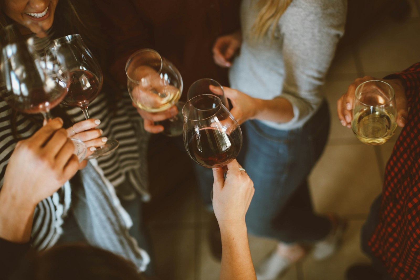 Glasses raised together in a toast